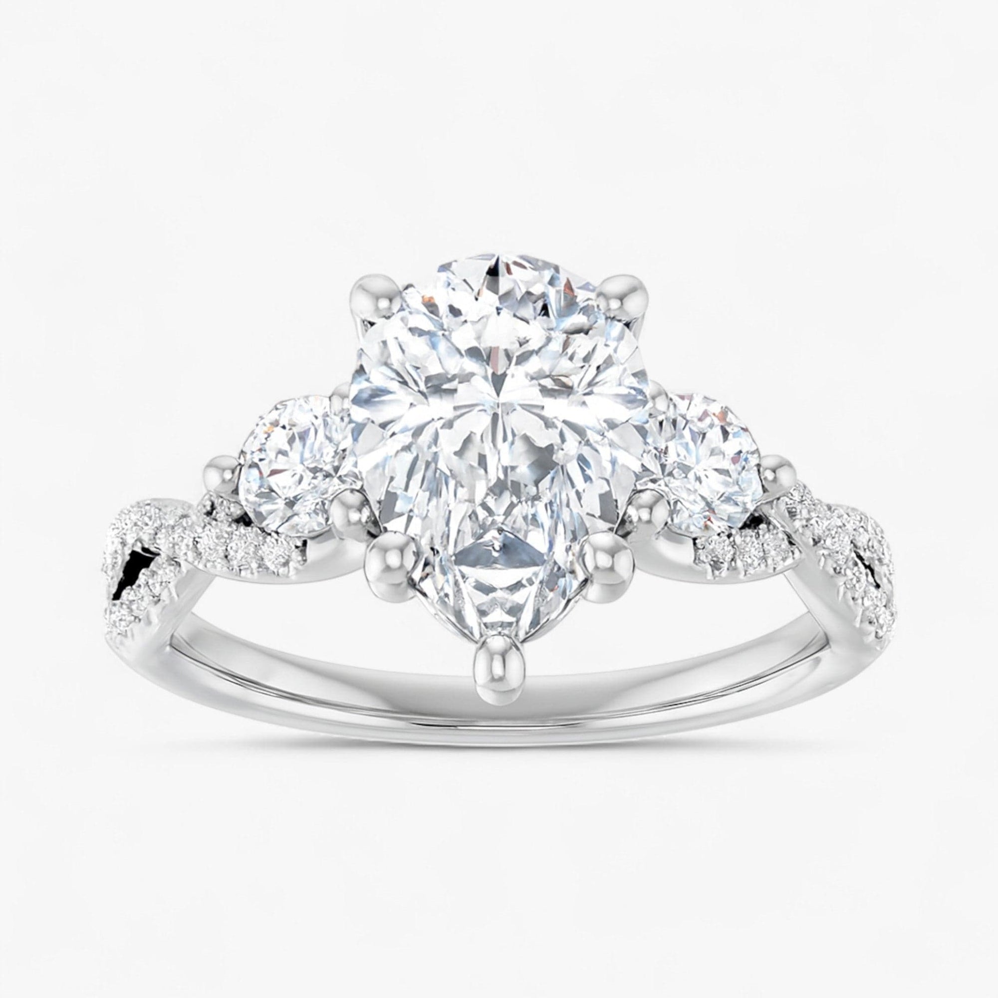 The Iconic 3-Stone Twisted Engagement Ring | Pear