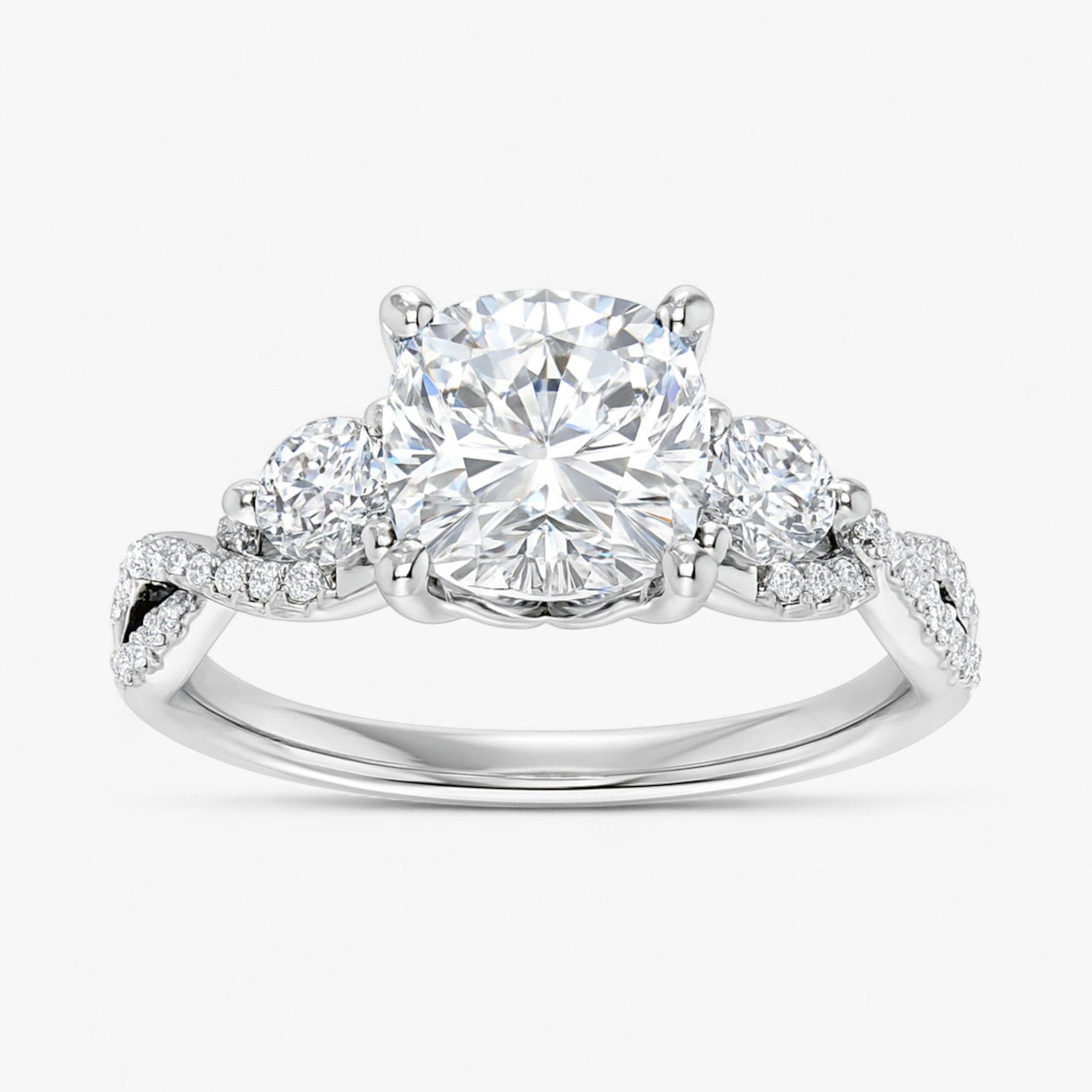 The Iconic 3-Stone Twisted Engagement Ring | Cushion