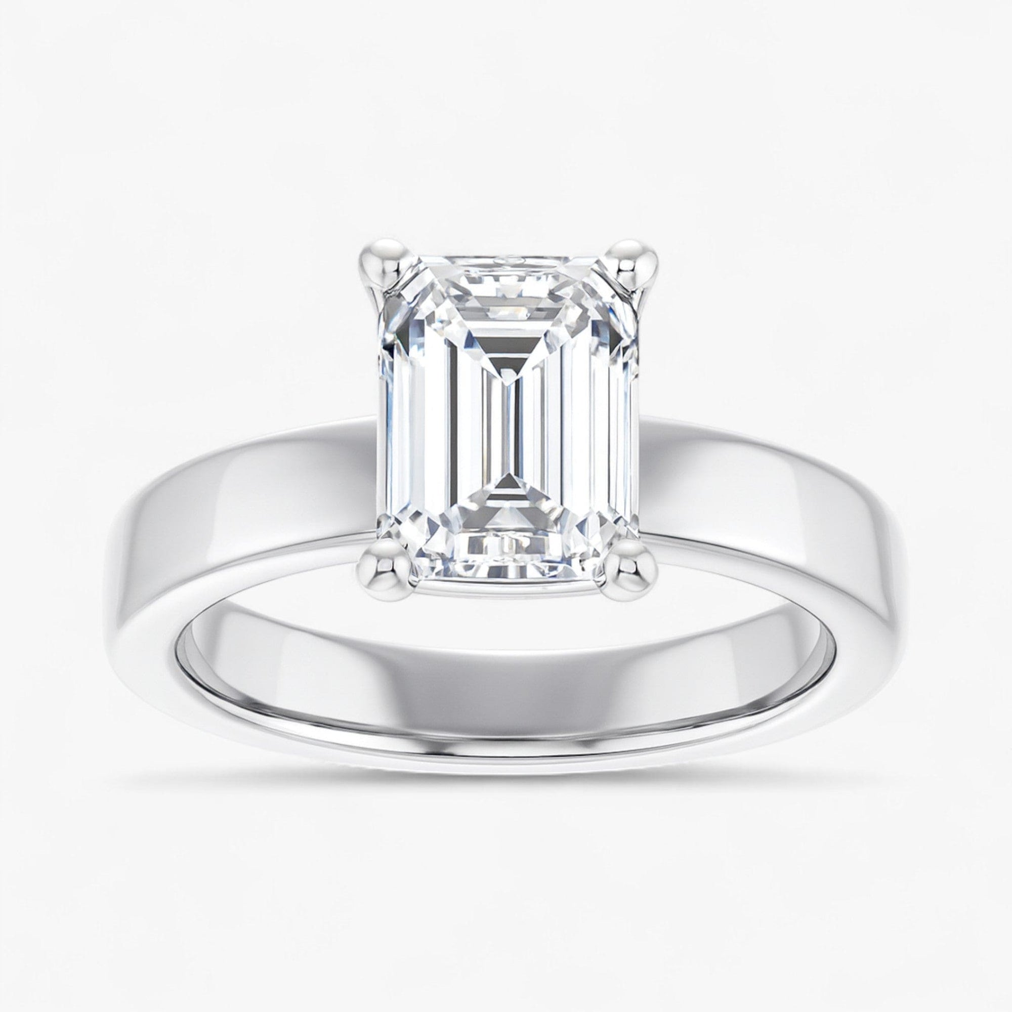 The Cigar Band Solitaire Engagement Ring | Emerald