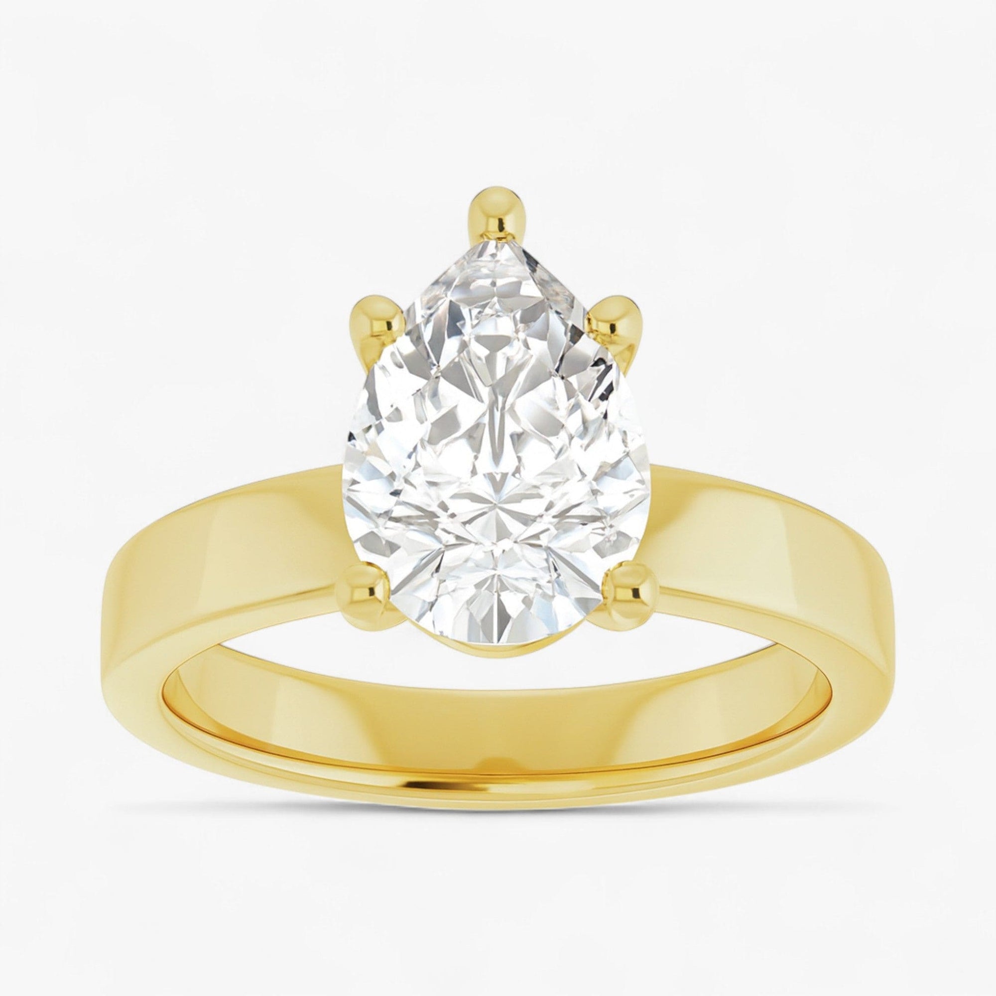 The Cigar Band Solitaire Engagement Ring | Pear