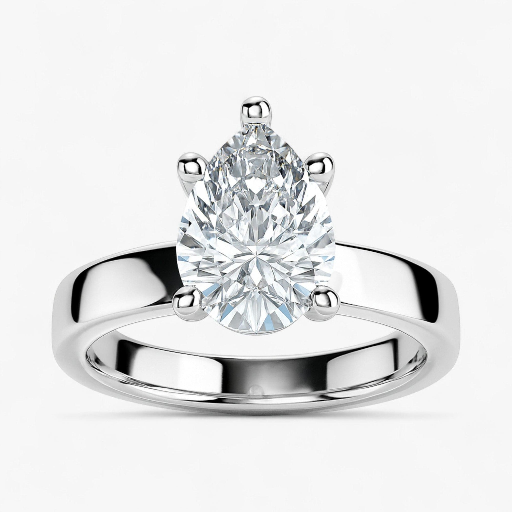 The Cigar Band Solitaire Engagement Ring | Pear