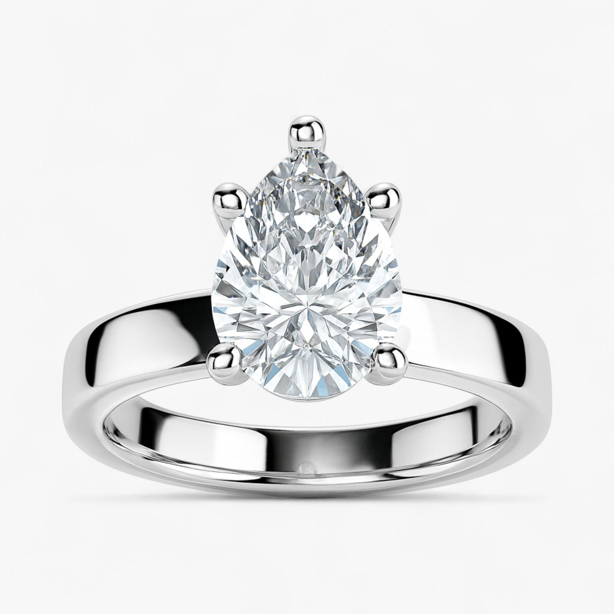The Cigar Band Solitaire Engagement Ring | Pear
