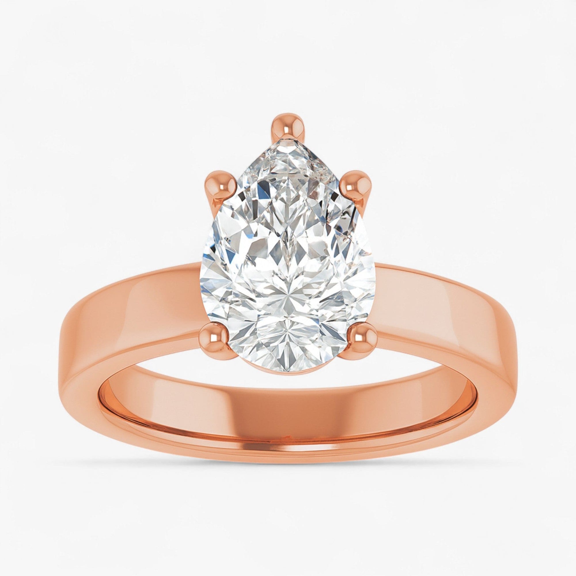 The Cigar Band Solitaire Engagement Ring | Pear