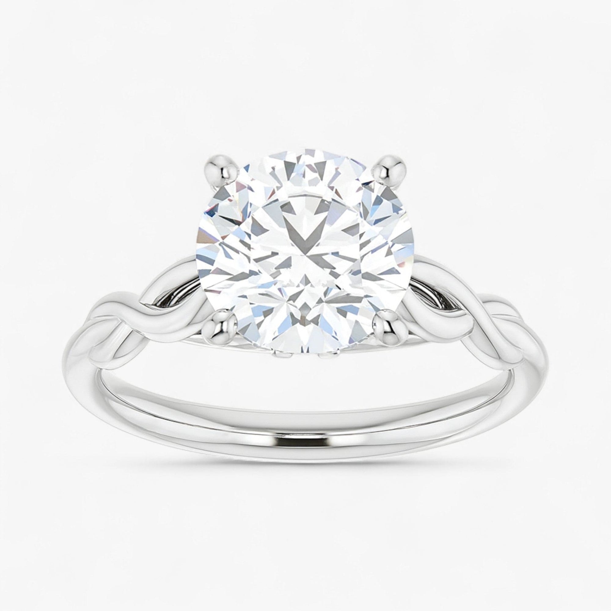 The Elegant Twisted Solitaire Engagement Ring | Round