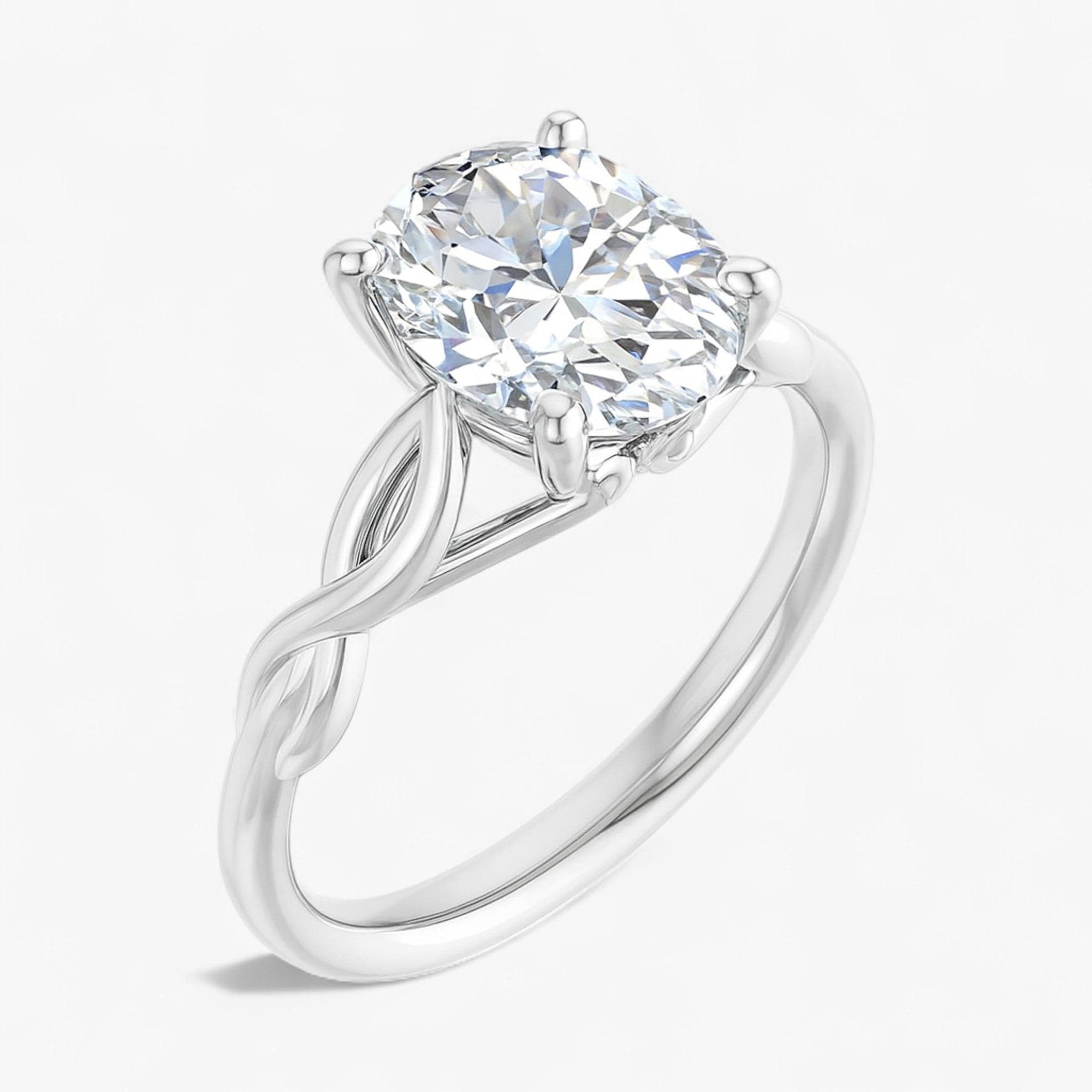 The Elegant Twisted Solitaire Engagement Ring | Oval