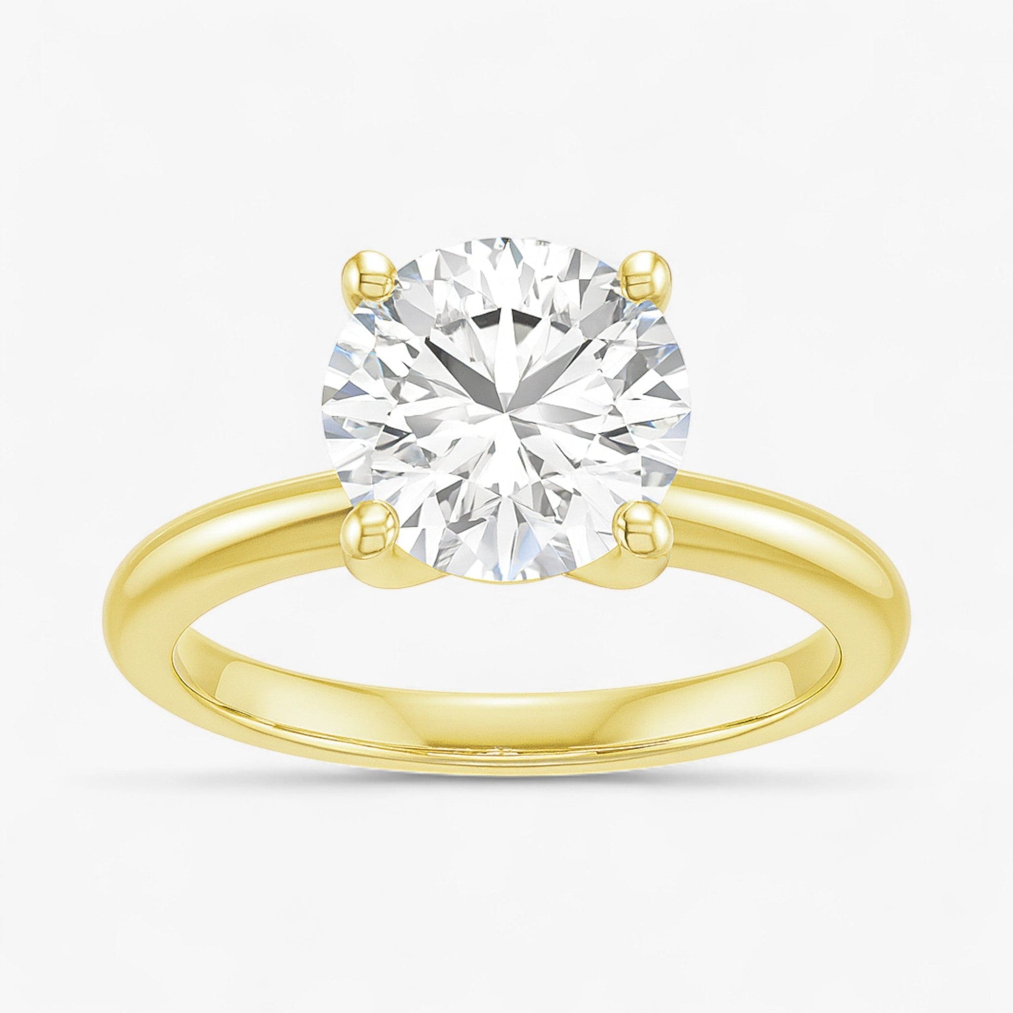 The Classic 4-Prong Solitaire Engagement Ring | Round