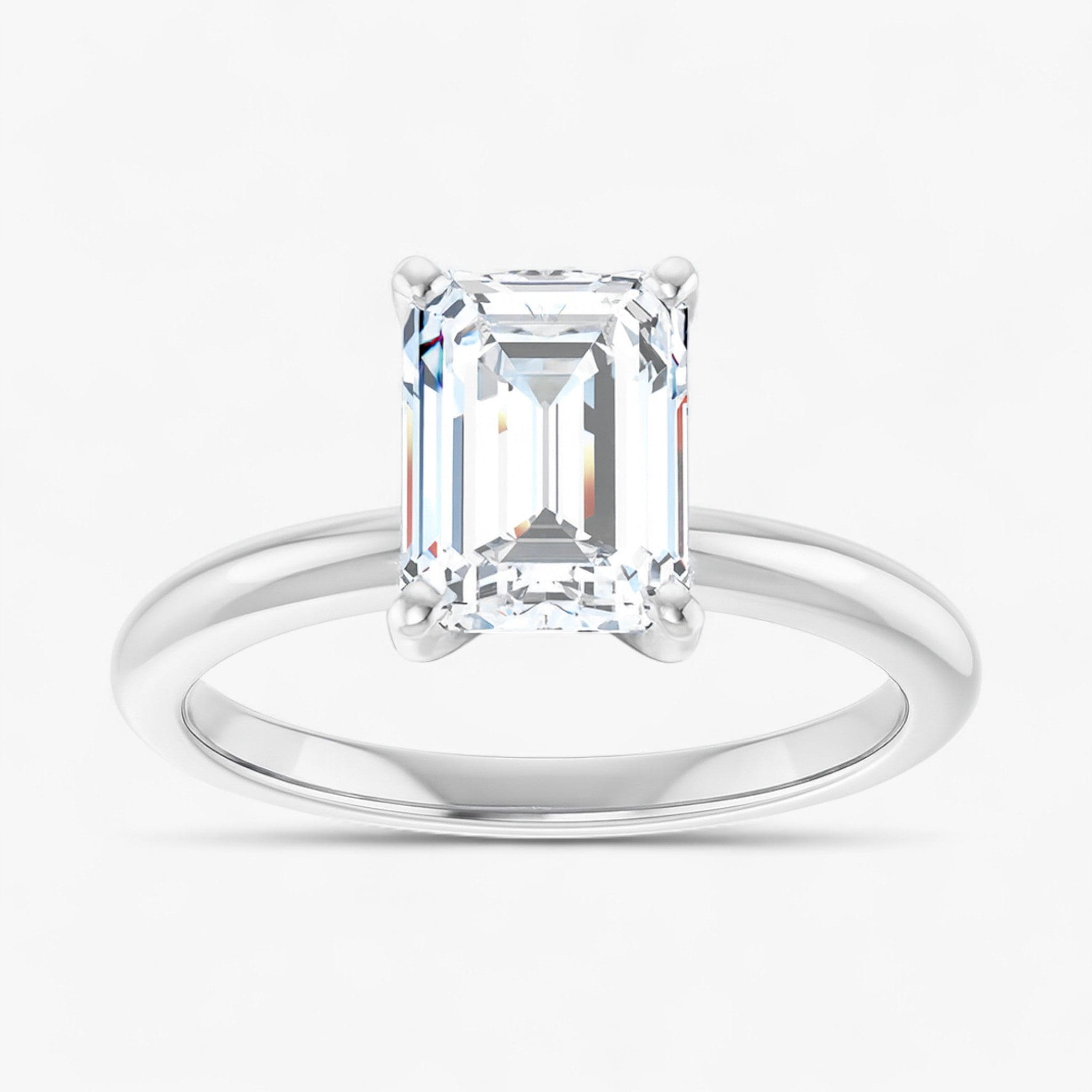 The Classic 4-Prong Solitaire Engagement Ring | Emerald