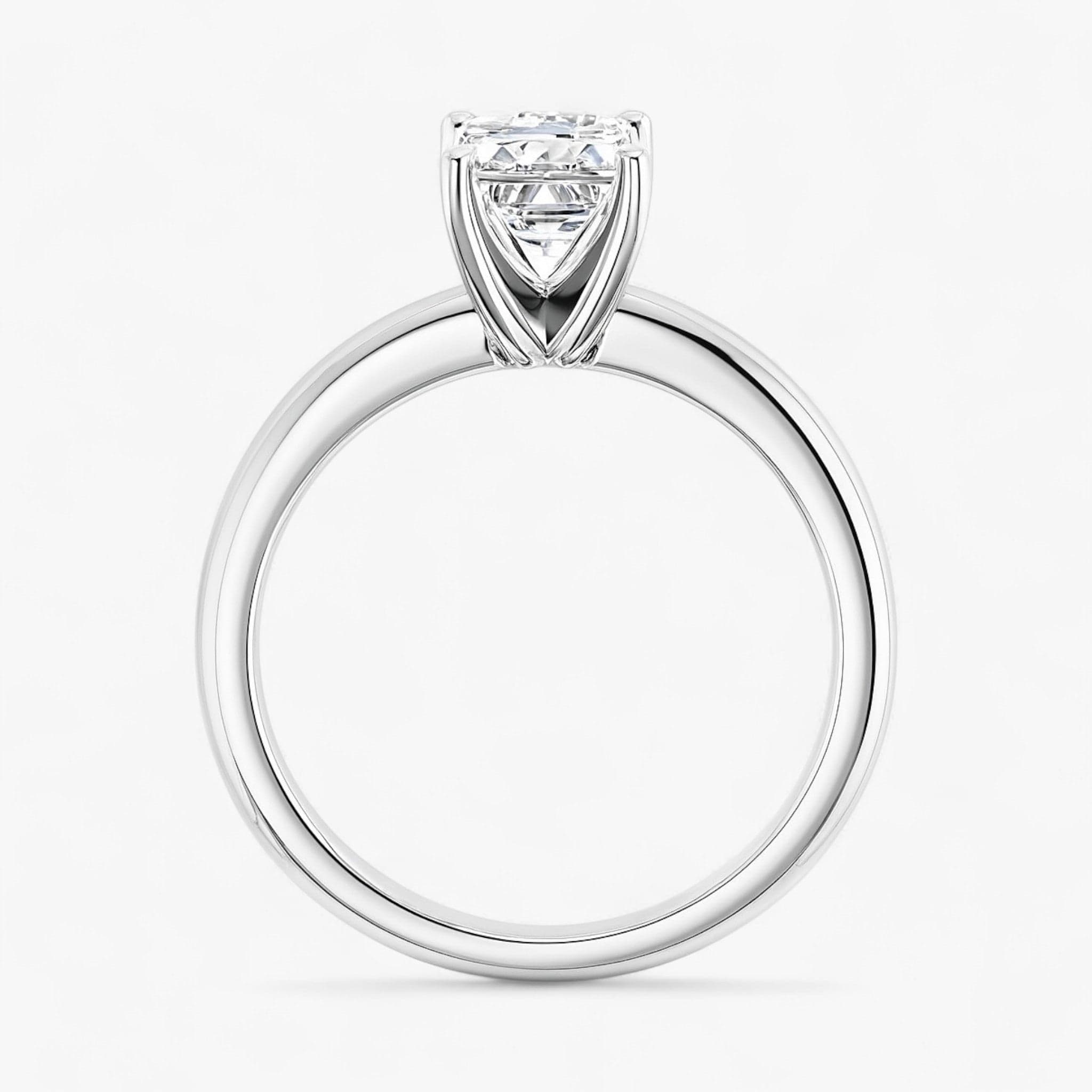 The Classic 4-Prong Solitaire Engagement Ring | Emerald