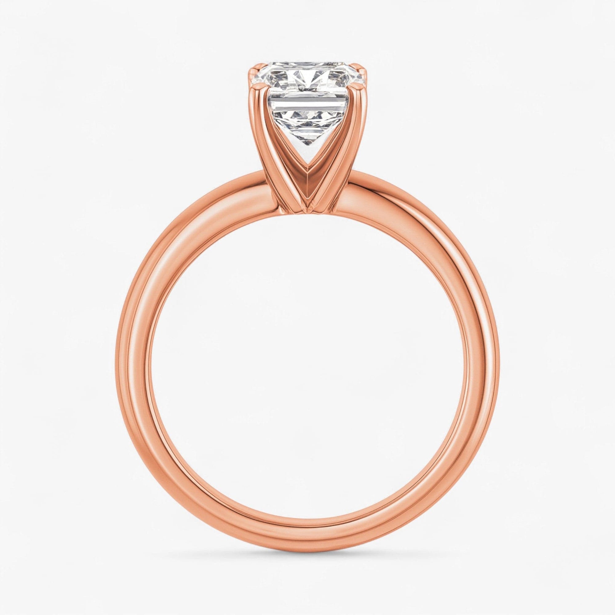 The Classic 4-Prong Solitaire Engagement Ring | Emerald