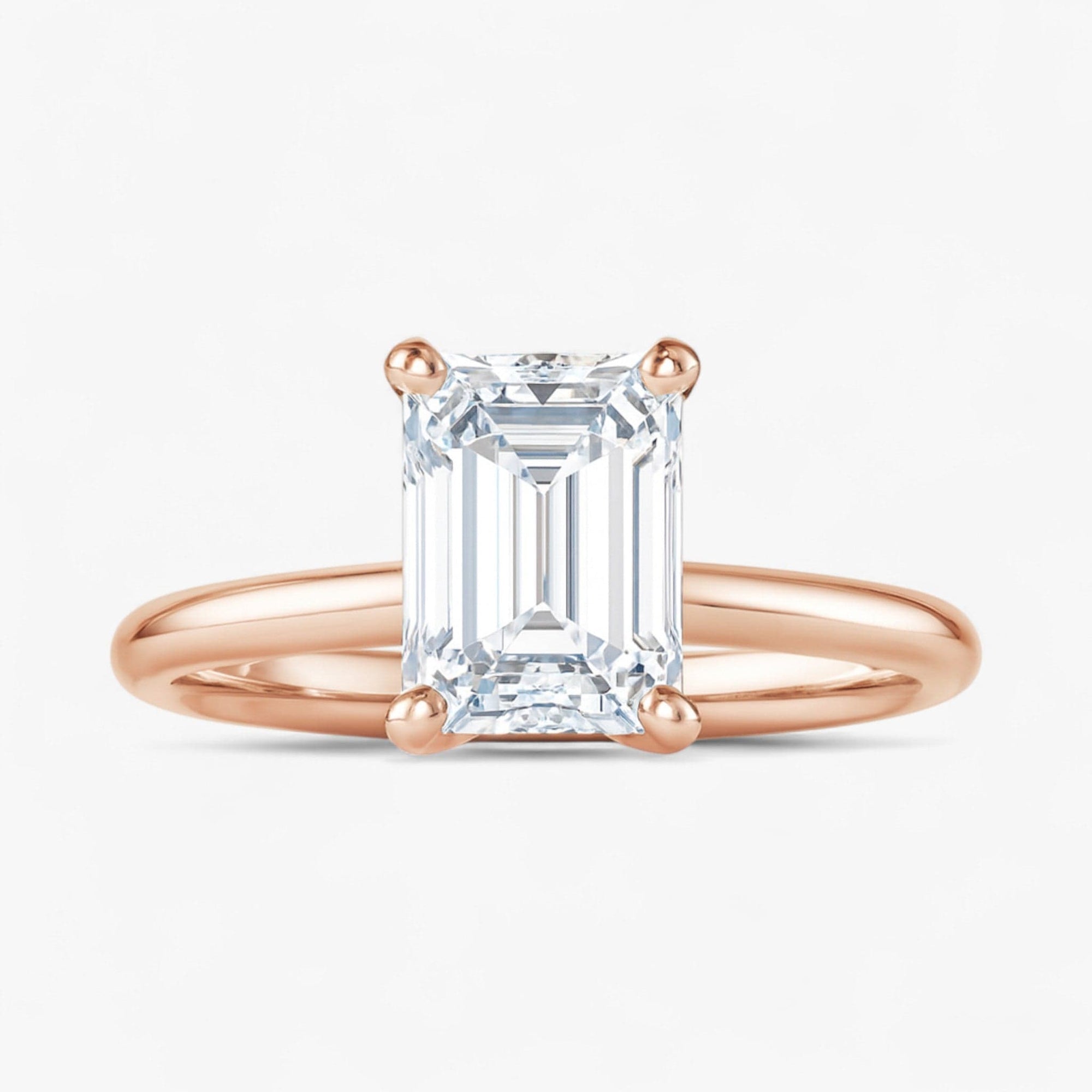 The Classic 4-Prong Solitaire Engagement Ring | Emerald