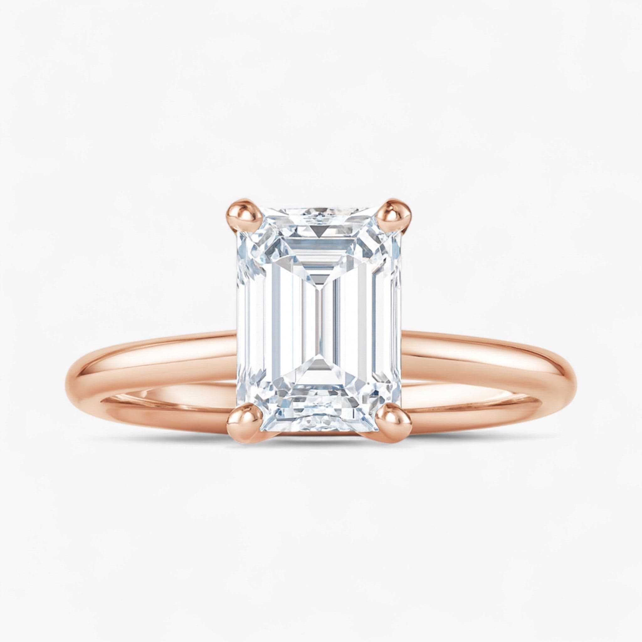 The Classic 4-Prong Solitaire Engagement Ring | Emerald