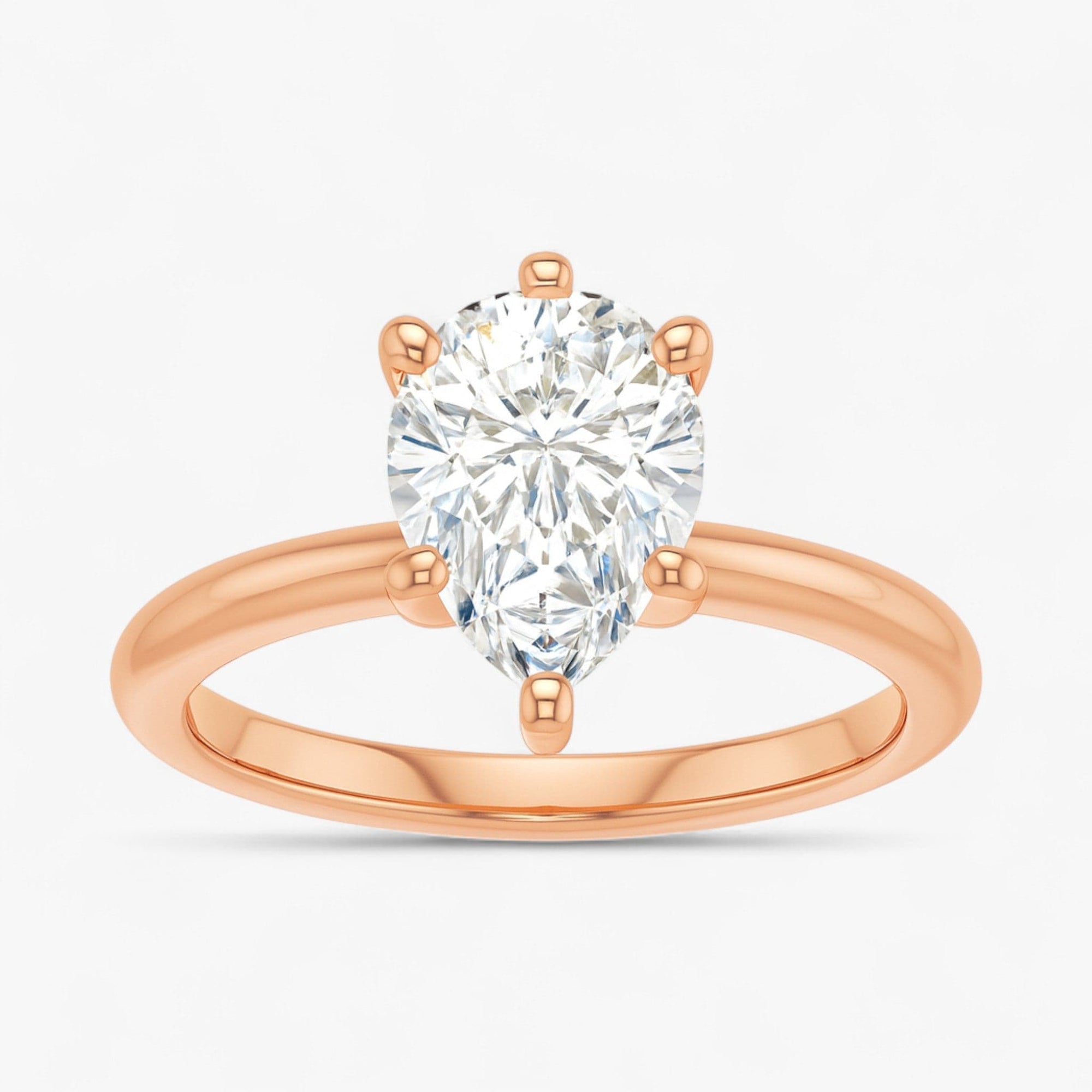 The Classic 4-Prong Solitaire Engagement Ring | Pear