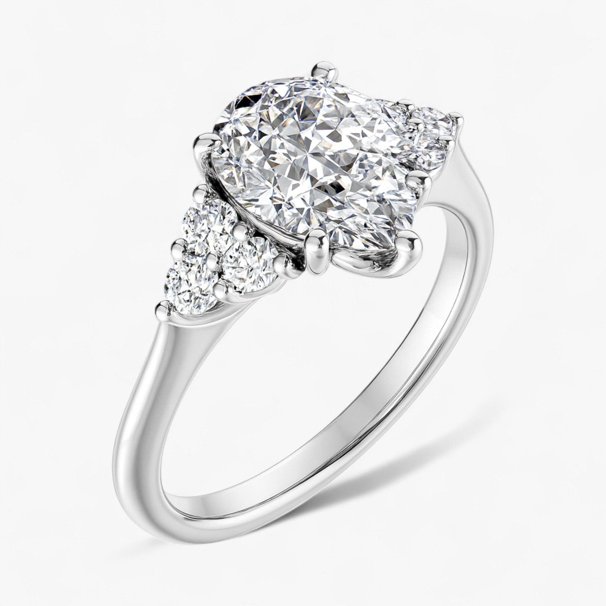 The Side Cluster Engagement Ring | Pear