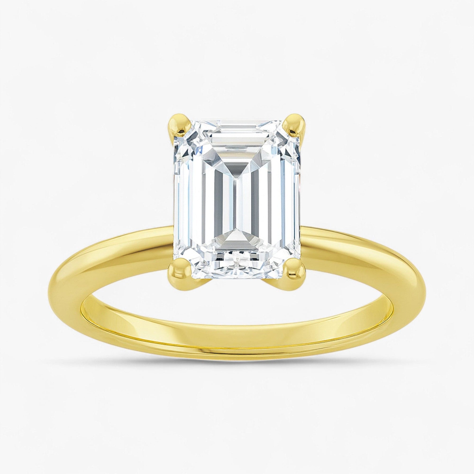 The Classic 4-Prong Solitaire Engagement Ring | Emerald