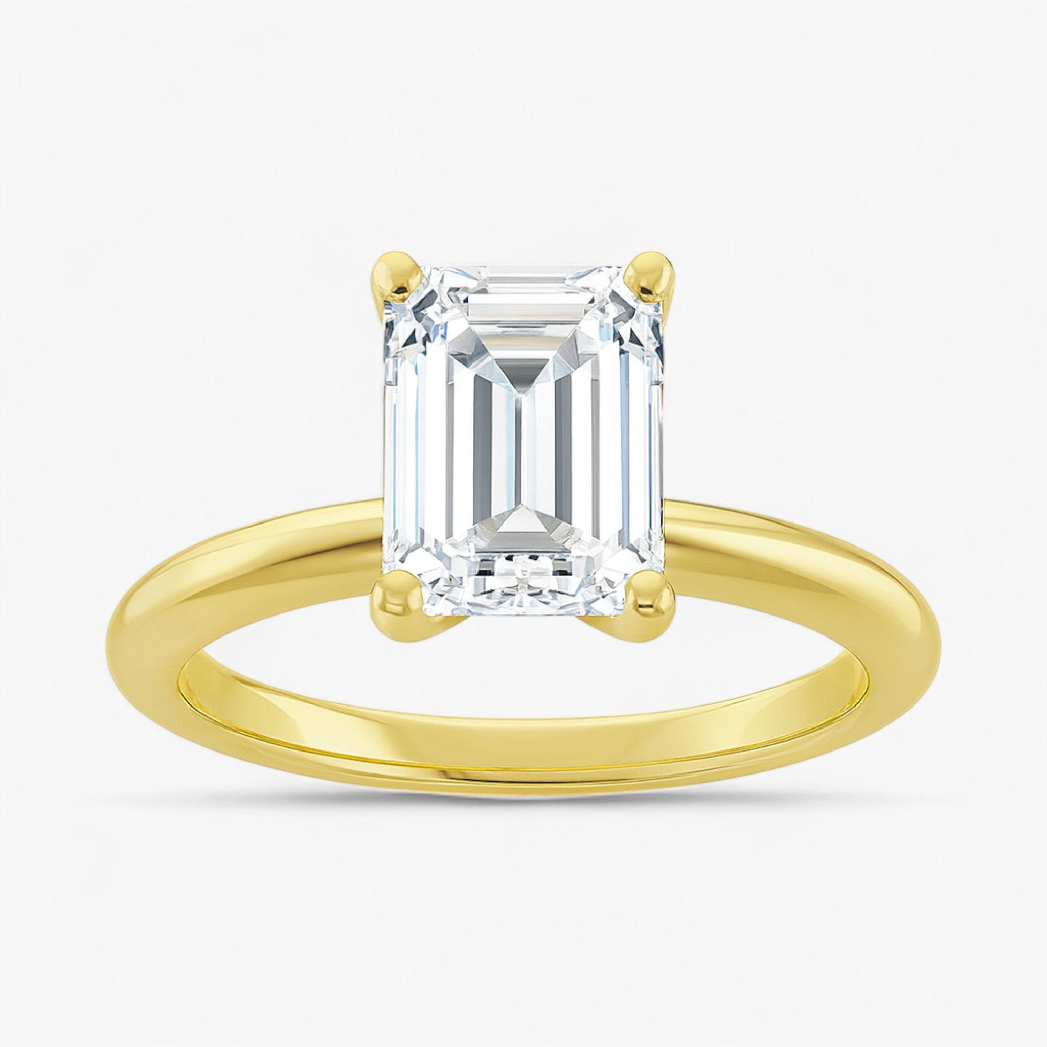 The Classic 4-Prong Solitaire Engagement Ring | Emerald