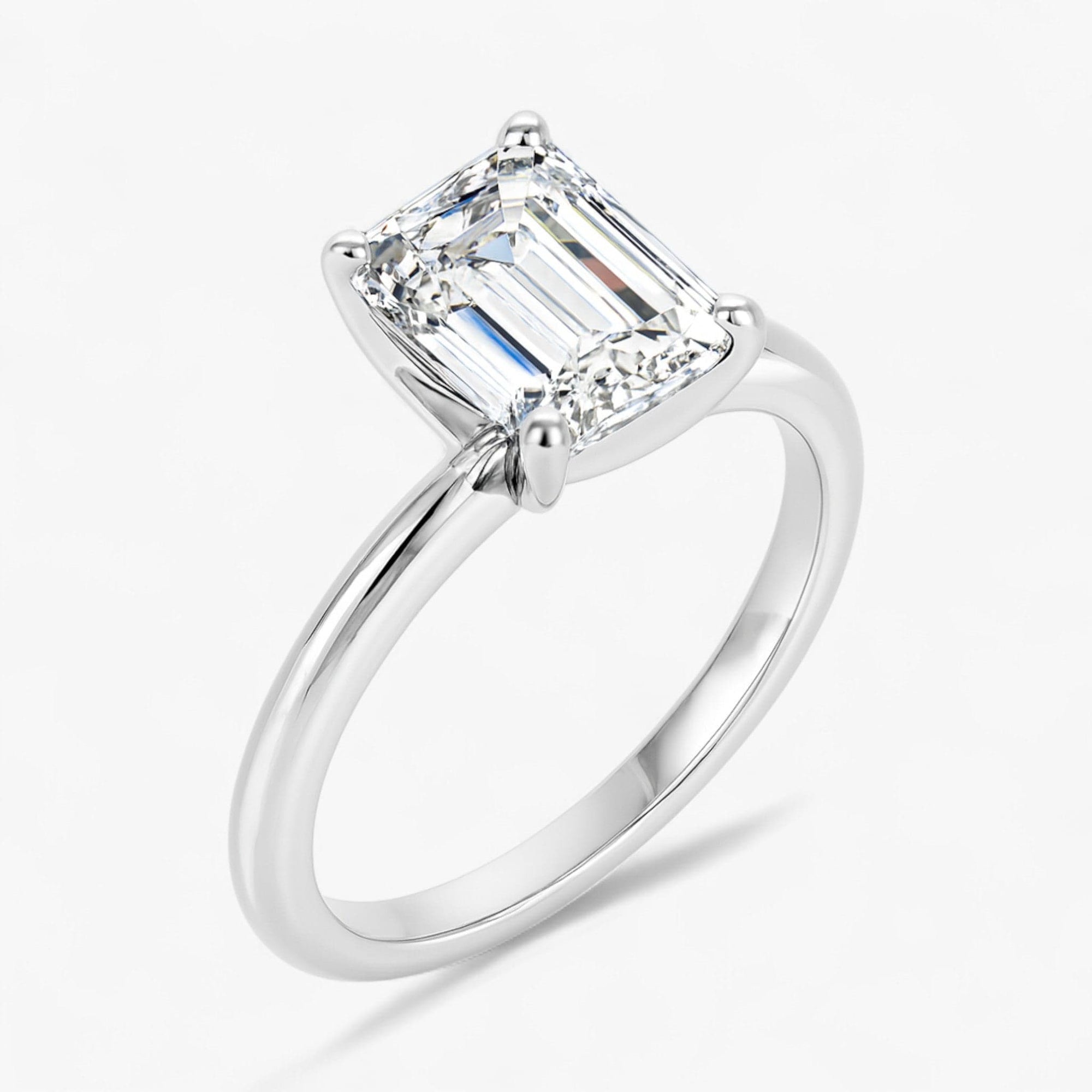 The Classic 4-Prong Solitaire Engagement Ring | Emerald