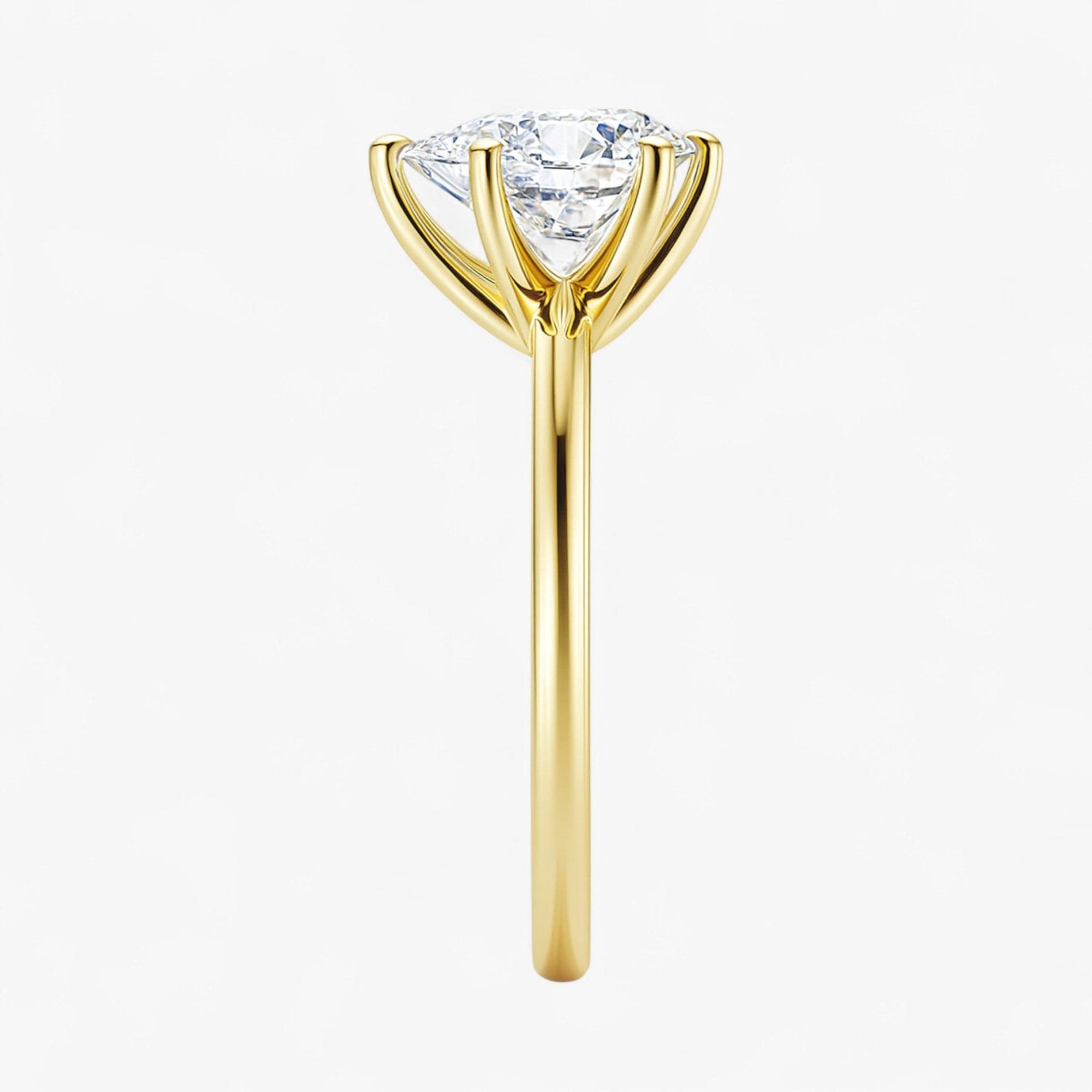 The Classic 4-Prong Solitaire Engagement Ring | Pear